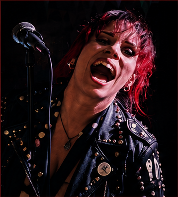 Rachel singing into a microphone on stage
